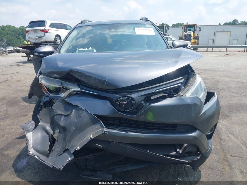 2018 TOYOTA RAV4 XLE - JTMWFREV7JD111785