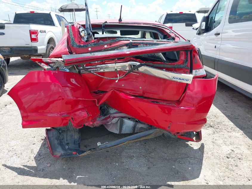 2014 Honda Insight Ex VIN: JHMZE2H72ES001084 Lot: 42596238