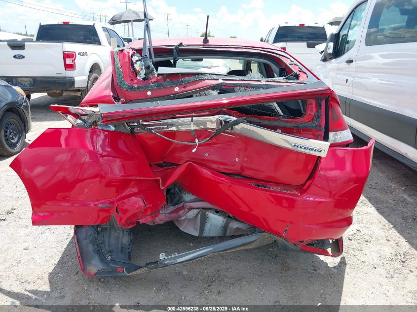 2014 Honda Insight Ex VIN: JHMZE2H72ES001084 Lot: 42596238