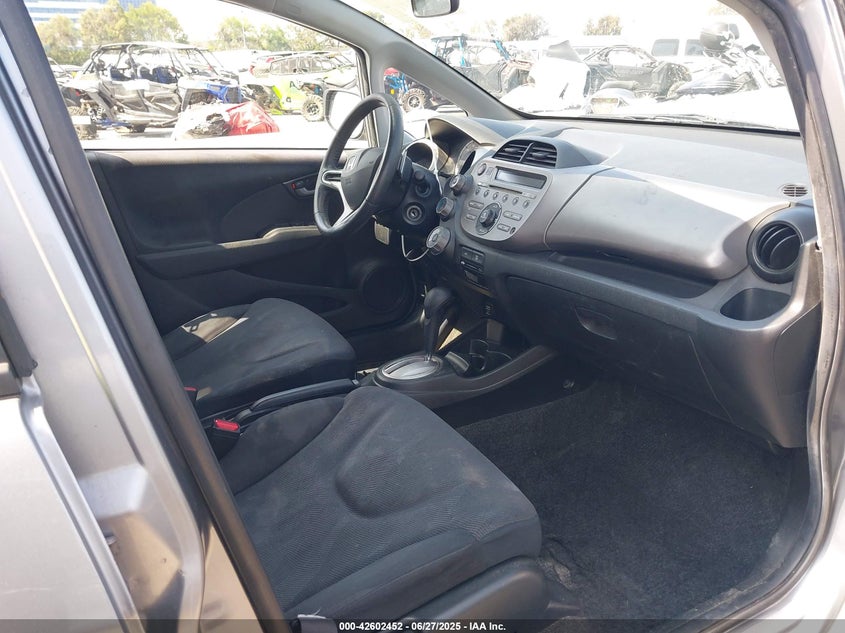 2009 HONDA FIT VIN: JHMGE88499S008698
