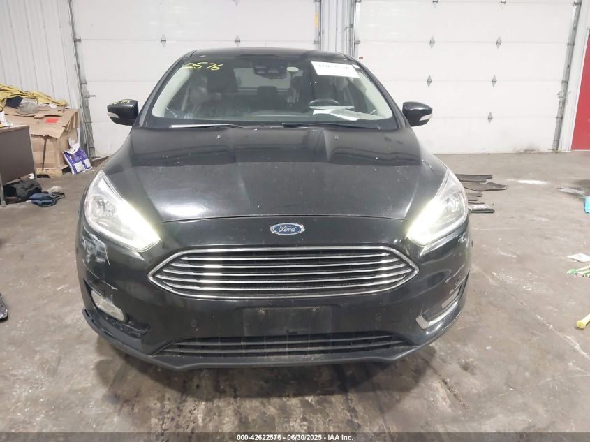 2016 Ford Focus Titanium VIN: 1FADP3J21GL379832 Lot: 42622576