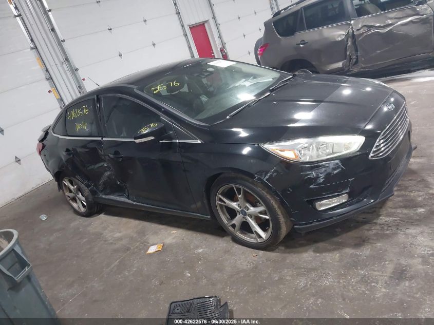 2016 Ford Focus Titanium VIN: 1FADP3J21GL379832 Lot: 42622576