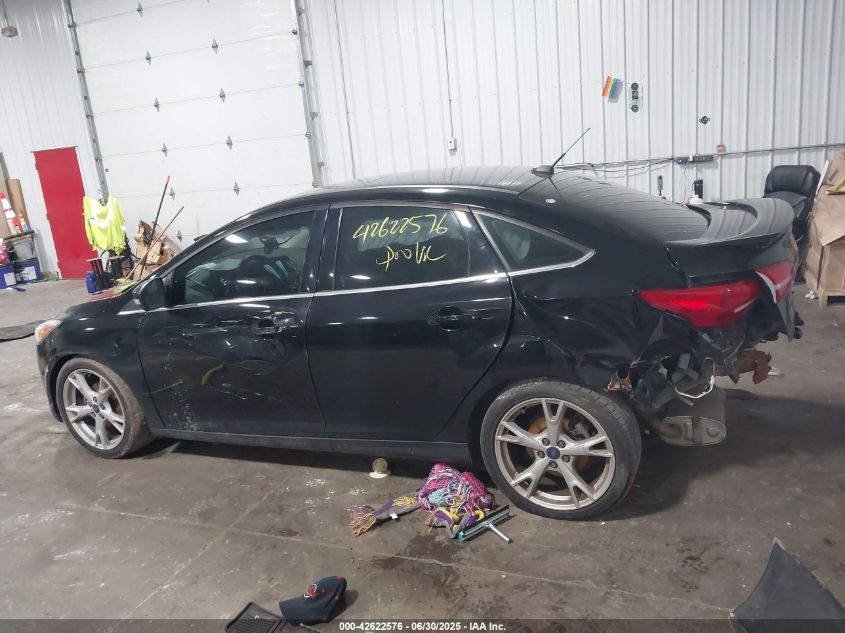 2016 Ford Focus Titanium VIN: 1FADP3J21GL379832 Lot: 42622576