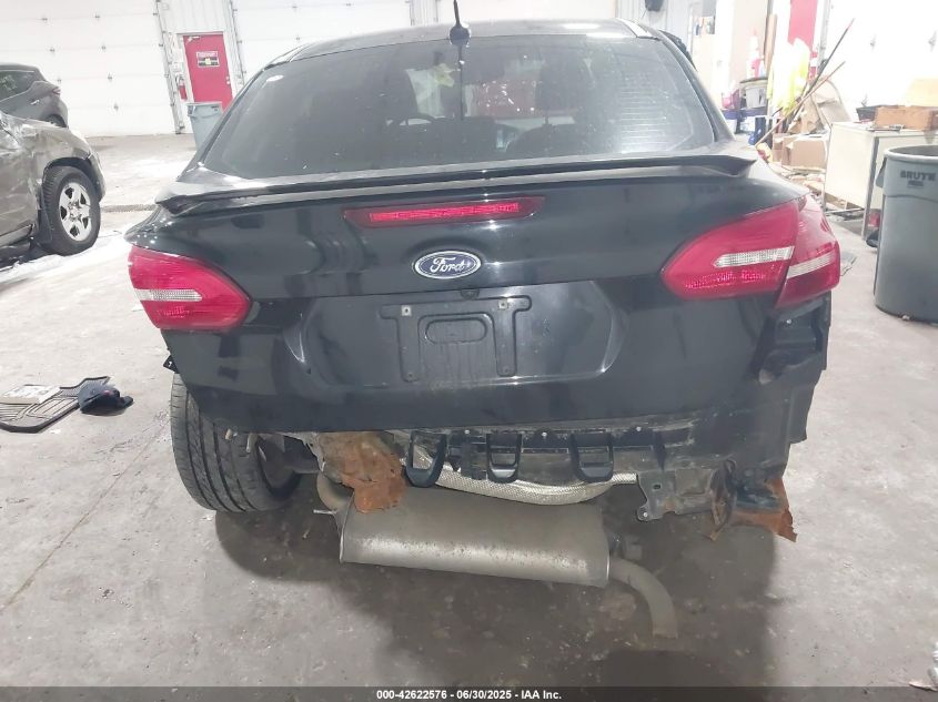 2016 Ford Focus Titanium VIN: 1FADP3J21GL379832 Lot: 42622576