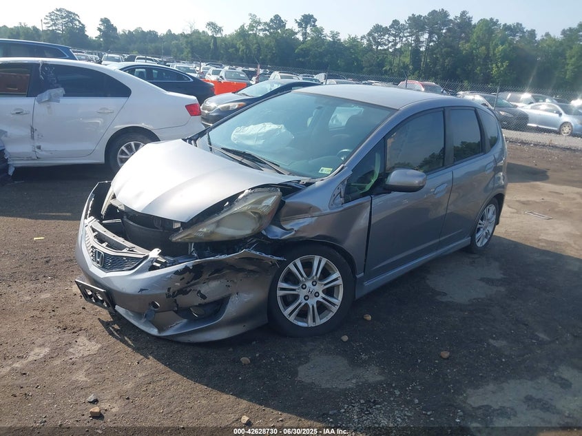 2009 HONDA FIT VIN: JHMGE88659S013897