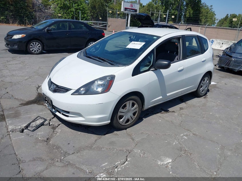 2009 HONDA FIT VIN: JHMGE87259S058739