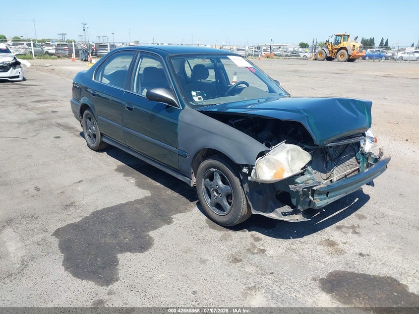 1HGEJ6574XL002906 1999 Honda Civic Lx auction photo 1