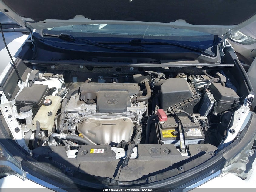 VIN JTMZFREV6JJ198898 2018 TOYOTA RAV4 LE