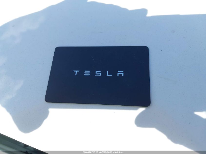 2023 Tesla Model Y Awd/Long Range Dual Motor All-Wheel Drive VIN: 7SAYGDEE2PA088474 Lot: 42674725