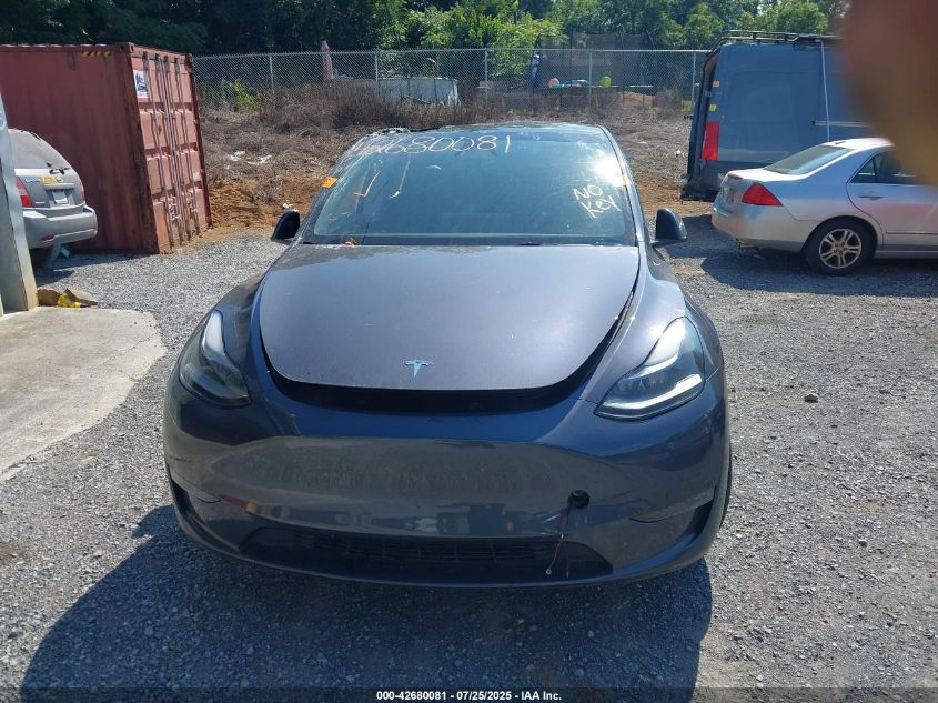 2023 Tesla Model Y Awd/Long Range Dual Motor All-Wheel Drive VIN: 7SAYGDEEXPF927368 Lot: 42680081