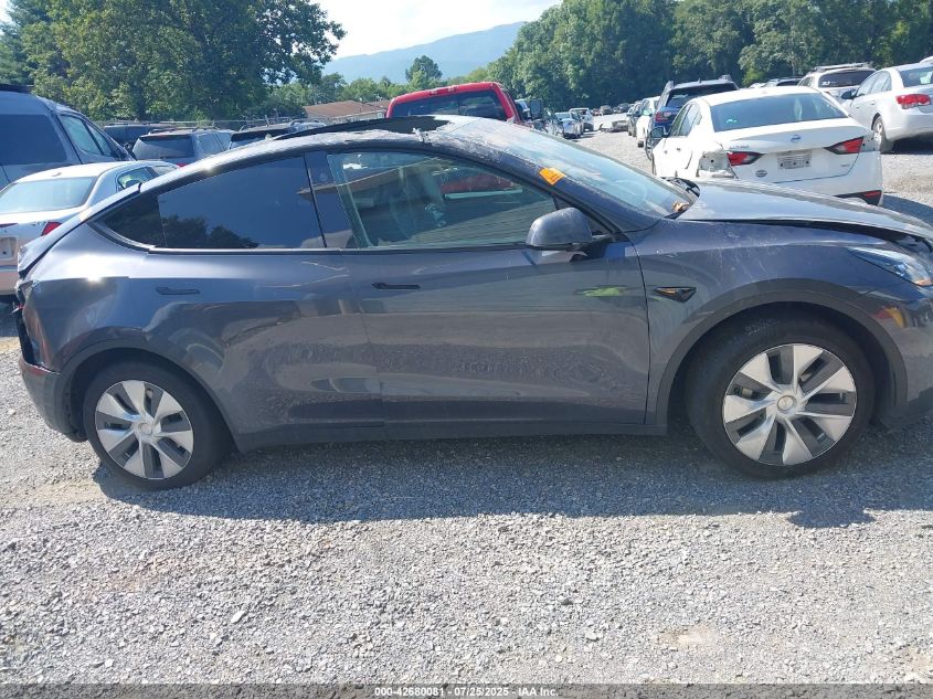 2023 Tesla Model Y Awd/Long Range Dual Motor All-Wheel Drive VIN: 7SAYGDEEXPF927368 Lot: 42680081