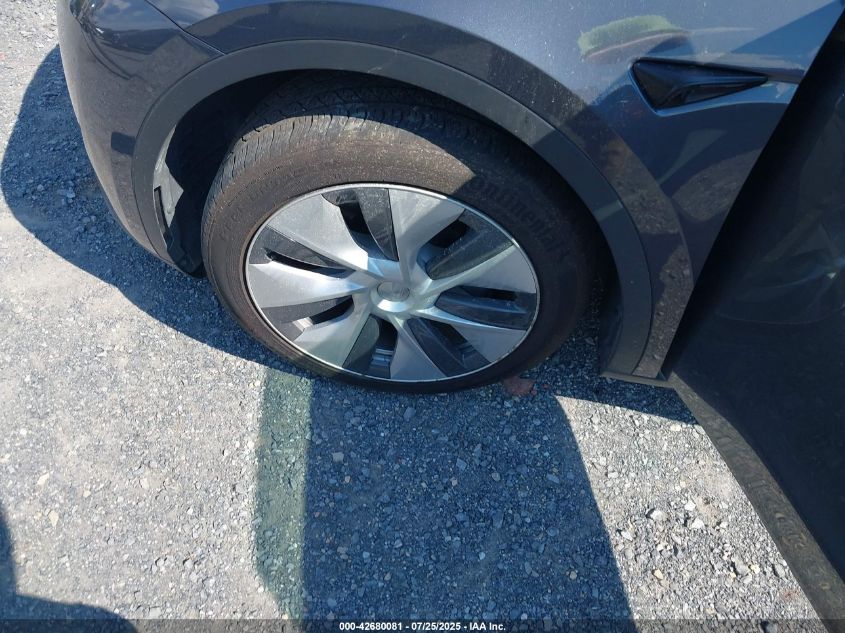2023 Tesla Model Y Awd/Long Range Dual Motor All-Wheel Drive VIN: 7SAYGDEEXPF927368 Lot: 42680081