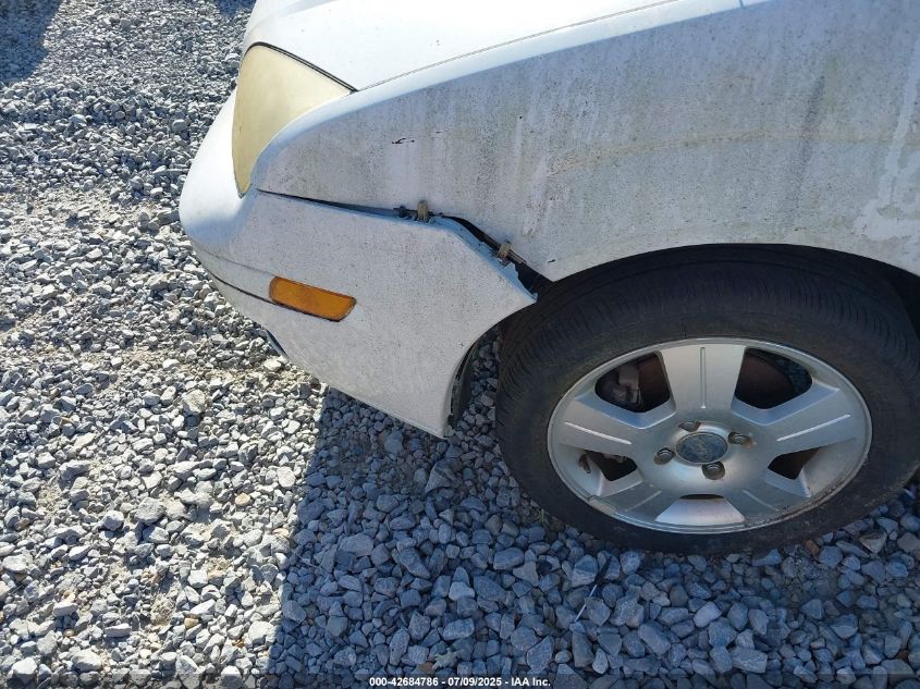 2007 Ford Focus VIN: 3FAFP37N552139062 Lot: 42684786