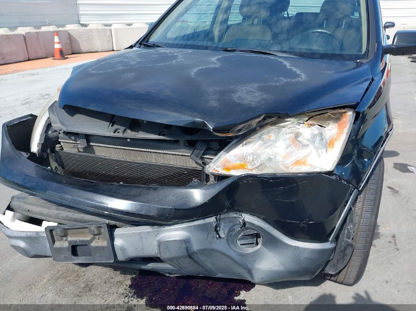 2009 Honda Cr-V Lx VIN: JHLRE38349C013132 Lot: 42690884