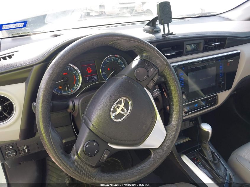 2017 Toyota Corolla Le VIN: 5YFBURHEXHP702829 Lot: 42700426