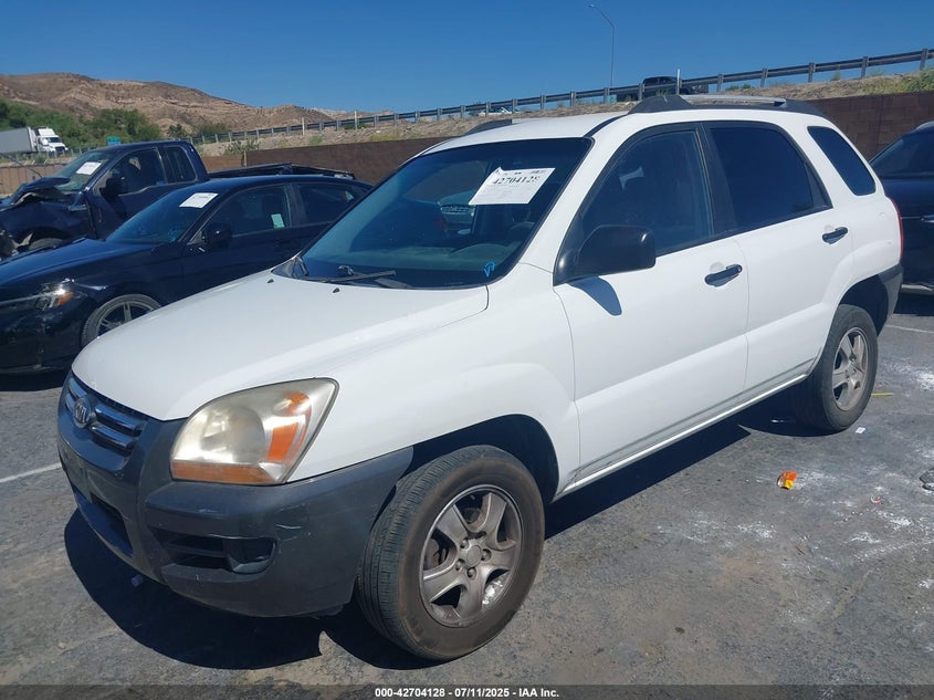 2007 KIA SPORTAGE VIN: KNDJF724477392137