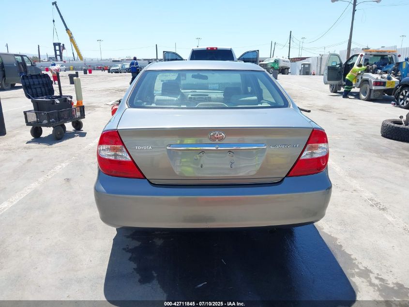 2002 Toyota Camry Le VIN: JTDBE32K420115522 Lot: 42711845