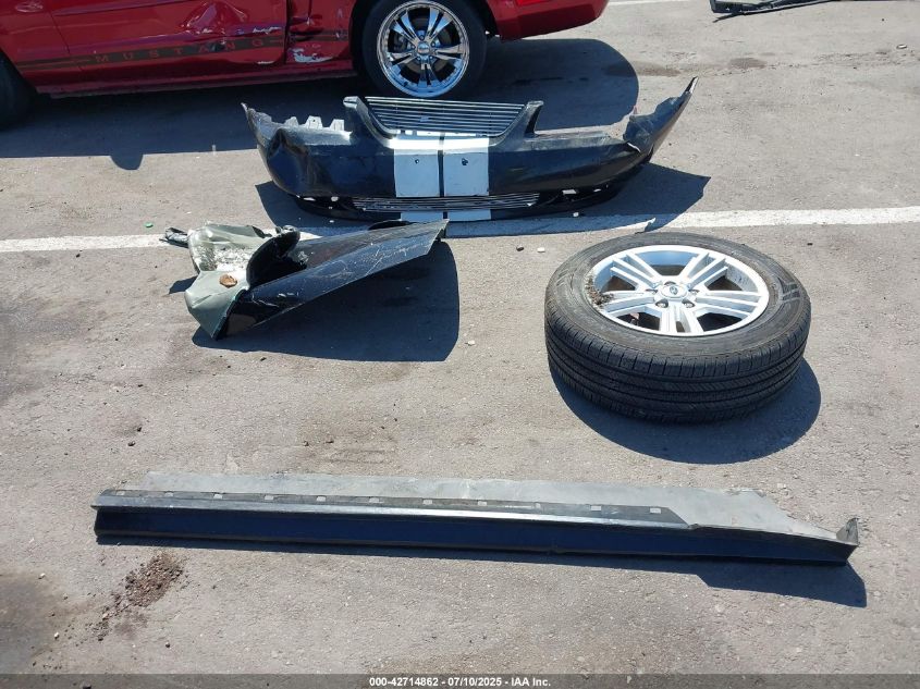 1999 Ford Mustang VIN: 1FAFP404XXF156673 Lot: 42714862