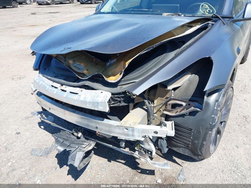 2023 Tesla Model Y Awd/Long Range Dual Motor All-Wheel Drive VIN: 7SAYGAEE5PF860614 Lot: 42716096