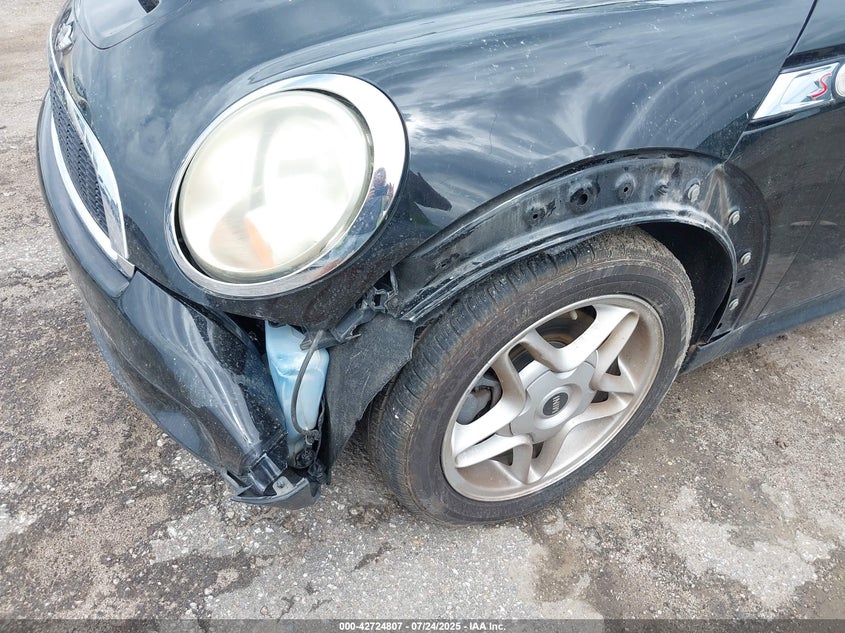 2009 Mini Cooper S VIN: WMWMS33569TG88618 Lot: 42724807