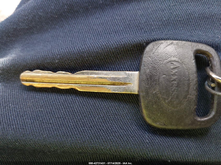 2002 Toyota Corolla Le VIN: 1NXBR12E72Z637049 Lot: 42731431