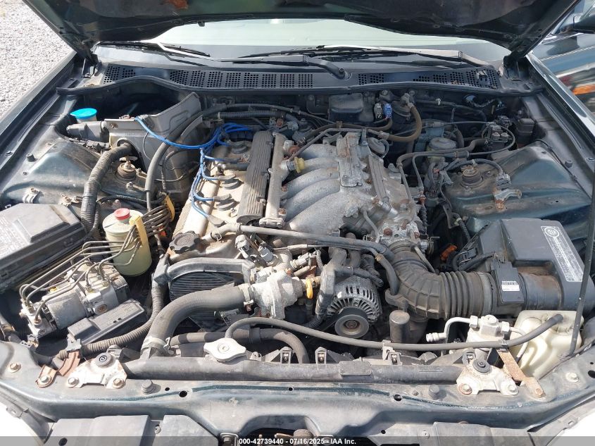 1998 Acura Tl 2.5 VIN: JH4UA2653WC000612 Lot: 42739440