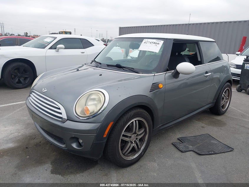 2010 MINI COOPER VIN: WMWMF3C57ATZ25476