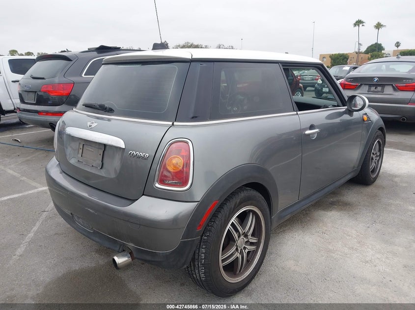 2010 MINI COOPER VIN: WMWMF3C57ATZ25476