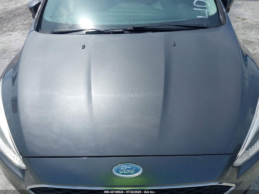 2018 Ford Focus Se VIN: 1FADP3F27JL261977 Lot: 42749524