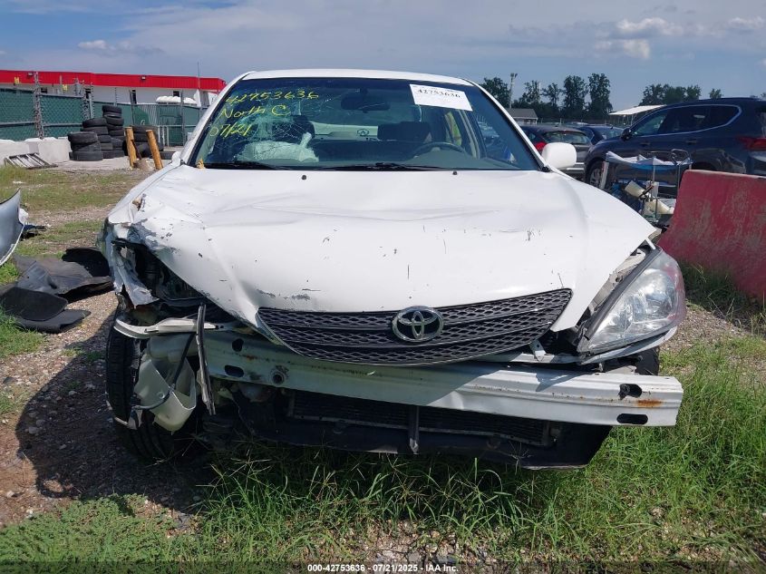 2002 Toyota Camry Le VIN: JTDBE32K220109833 Lot: 42753636