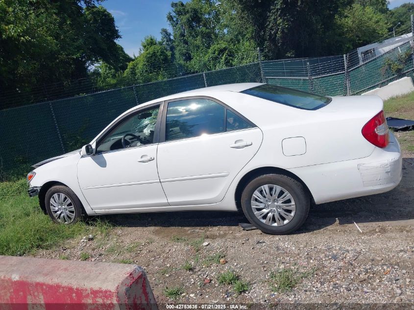 2002 Toyota Camry Le VIN: JTDBE32K220109833 Lot: 42753636