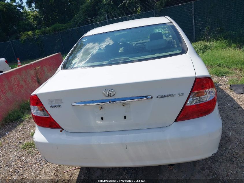 2002 Toyota Camry Le VIN: JTDBE32K220109833 Lot: 42753636