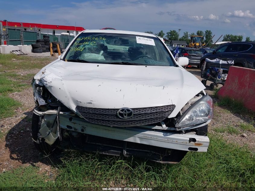 2002 Toyota Camry Le VIN: JTDBE32K220109833 Lot: 42753636