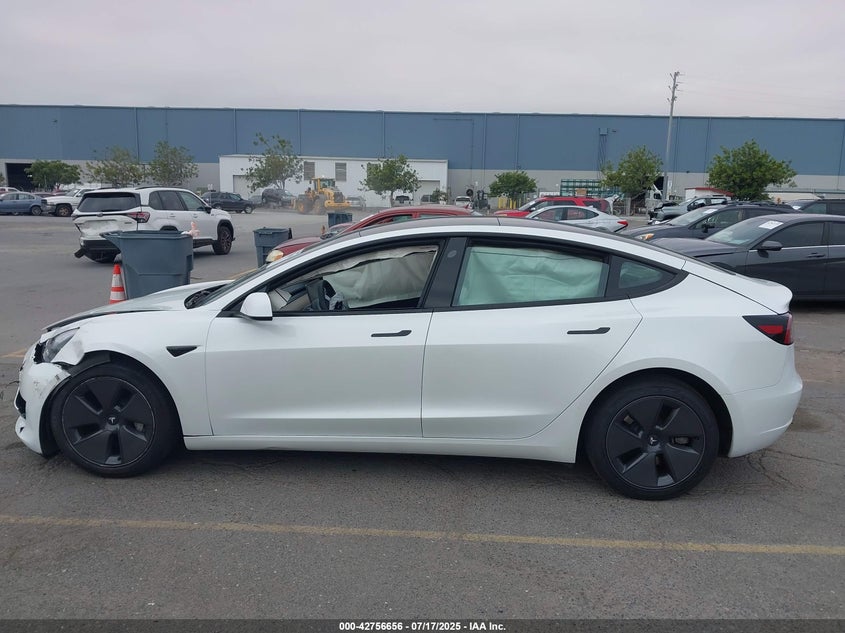 2023 Tesla Model 3 Long Range Dual Motor All-Wheel Drive VIN: 5YJ3E1EB3PF634557 Lot: 42756656