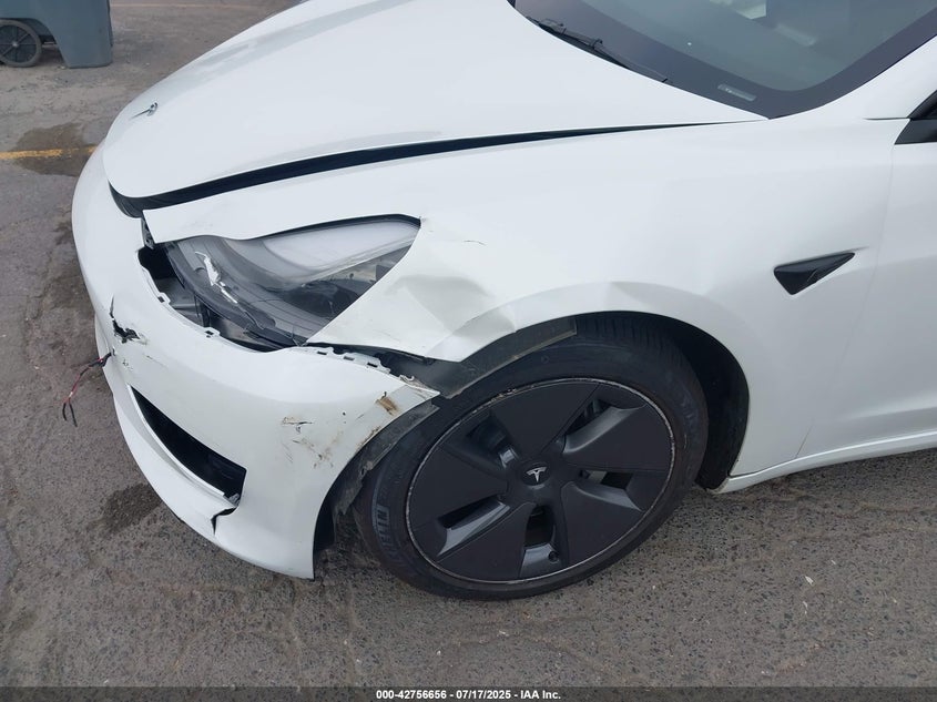 2023 Tesla Model 3 Long Range Dual Motor All-Wheel Drive VIN: 5YJ3E1EB3PF634557 Lot: 42756656