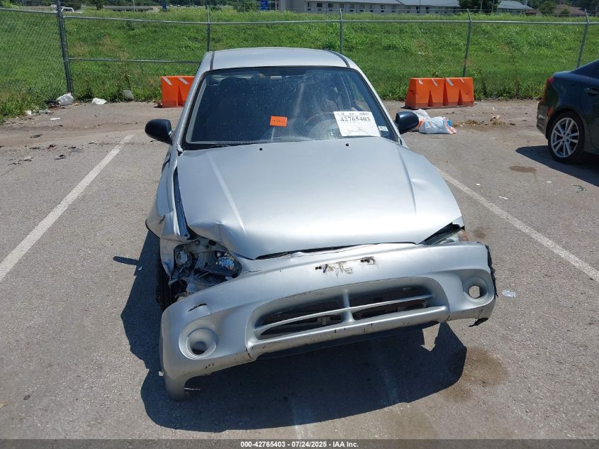 2000 Hyundai Accent L VIN: KMHCF35G6YU019915 Lot: 42765403