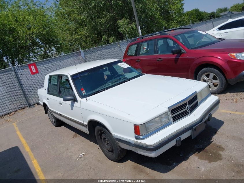 1B3XC56RXND723509 DODGE DYNASTY Photo 1