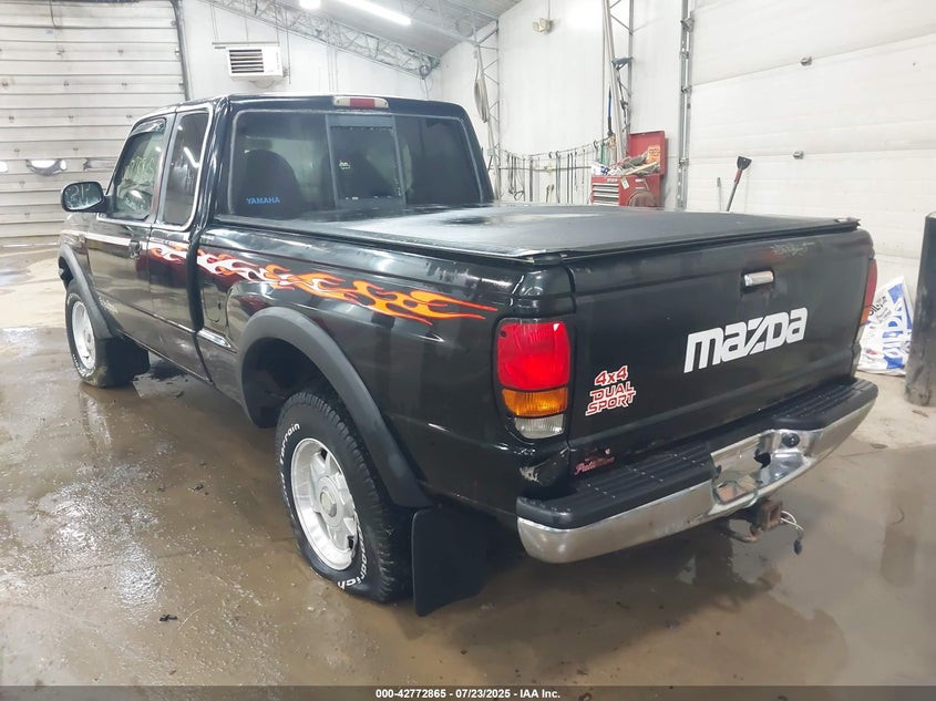 1998 Mazda Unknown black null null 4F4ZI17XOX1M34800 photo #4