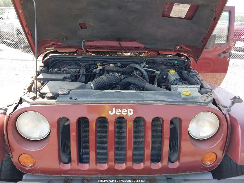 2007 Jeep Wrangler Unlimited Sahara VIN: 1J4GB59197L226591 Lot: 42774414