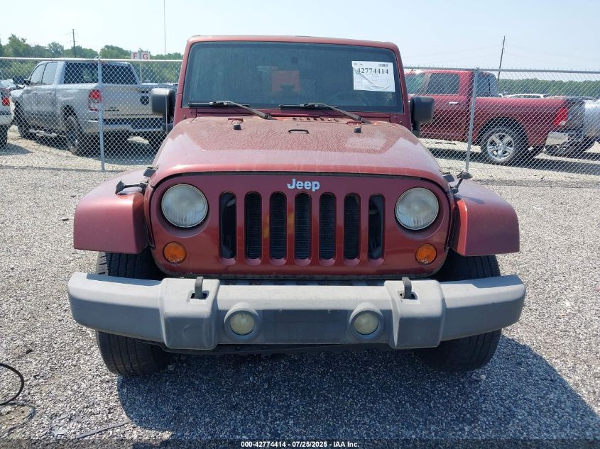 2007 Jeep Wrangler Unlimited Sahara VIN: 1J4GB59197L226591 Lot: 42774414