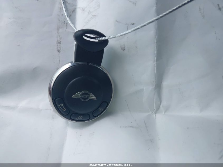 2011 Mini Cooper VIN: WMWSU3C58BT095623 Lot: 42784270