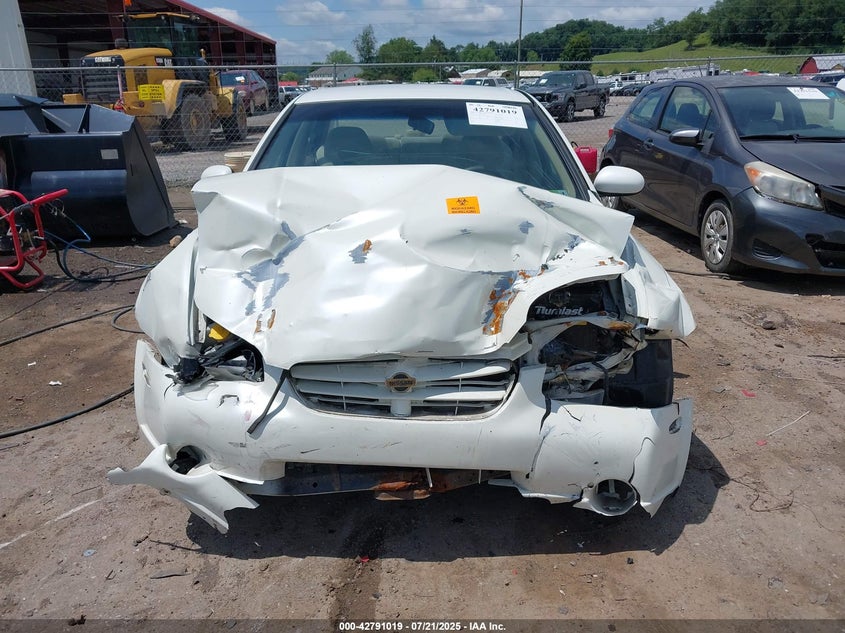 2000 Nissan Maxima Gle/Gxe/Se VIN: JN1CA31DXYT703812 Lot: 42791019