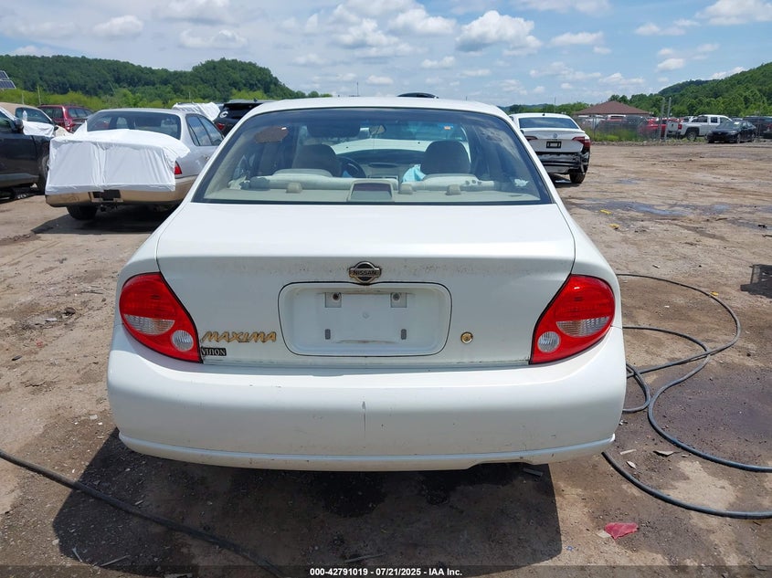 2000 Nissan Maxima Gle/Gxe/Se VIN: JN1CA31DXYT703812 Lot: 42791019