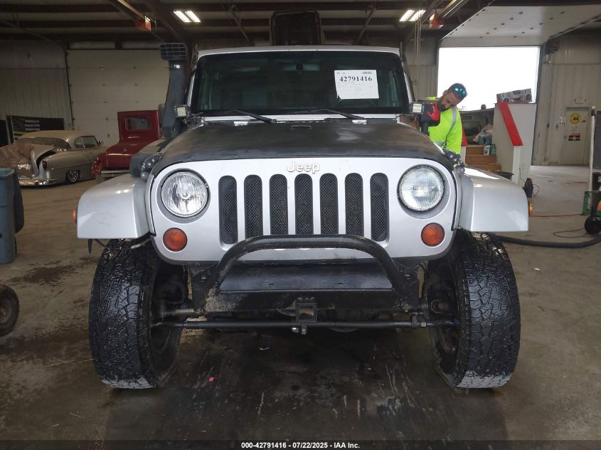 2009 Jeep Wrangler Unlimited Sahara VIN: 1J4GA59179L770285 Lot: 42791416