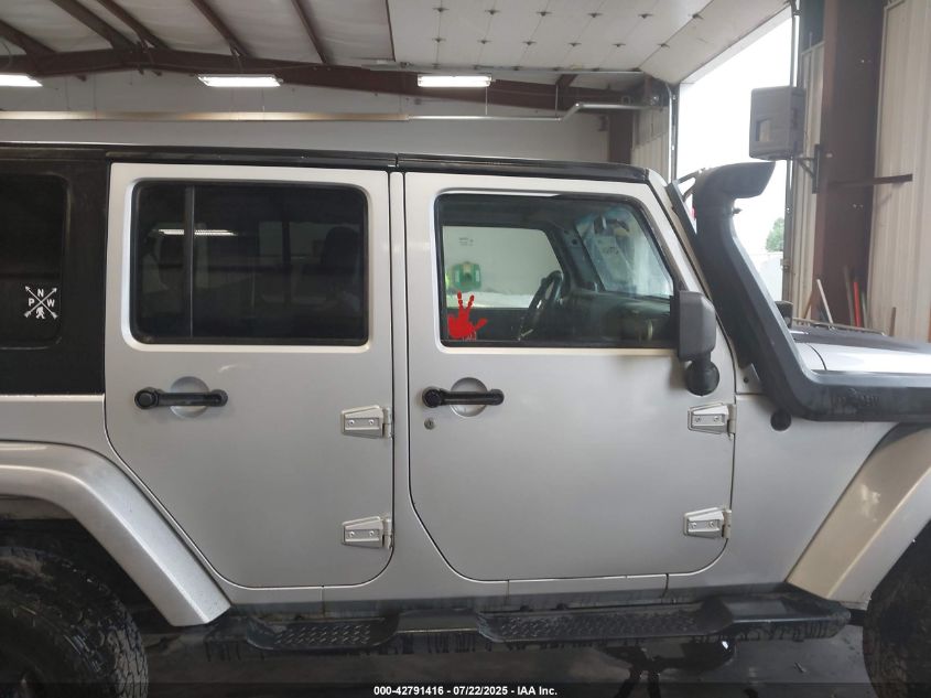 2009 Jeep Wrangler Unlimited Sahara VIN: 1J4GA59179L770285 Lot: 42791416