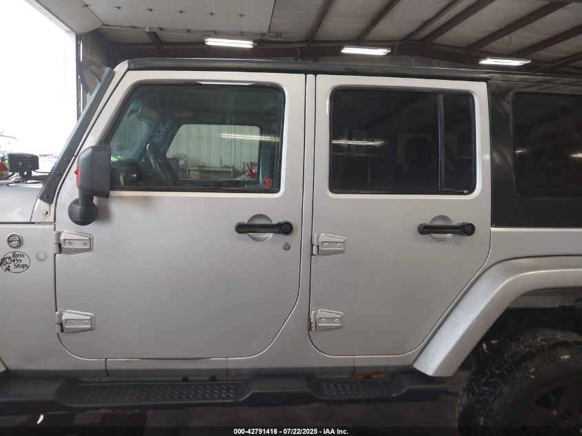 2009 Jeep Wrangler Unlimited Sahara VIN: 1J4GA59179L770285 Lot: 42791416