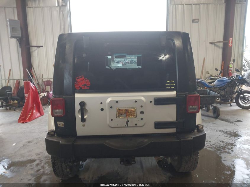 2009 Jeep Wrangler Unlimited Sahara VIN: 1J4GA59179L770285 Lot: 42791416