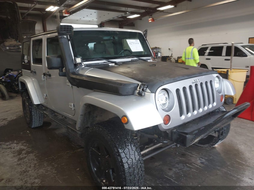 1J4GA59179L770285 2009 Jeep Wrangler Unlimited Sahara auction photo 1