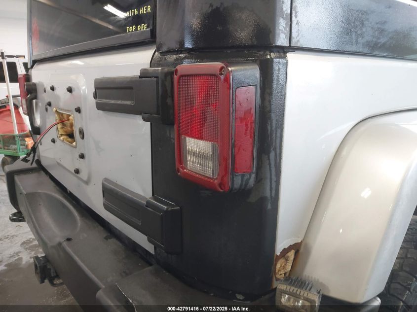 2009 Jeep Wrangler Unlimited Sahara VIN: 1J4GA59179L770285 Lot: 42791416