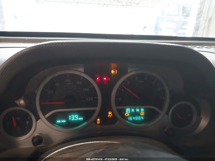 2009 Jeep Wrangler Unlimited Sahara VIN: 1J4GA59179L770285 Lot: 42791416